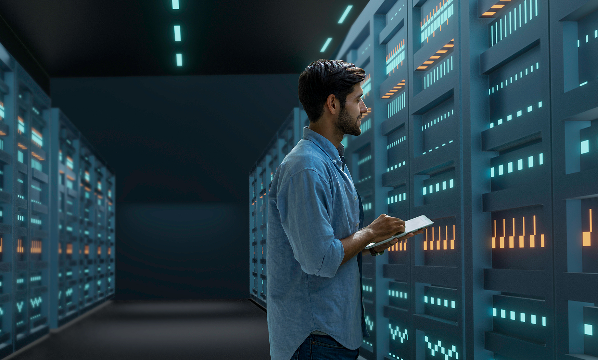 Male _IT_Expert_With Laptop_In_Server_Room Laptop_In_Server_Room