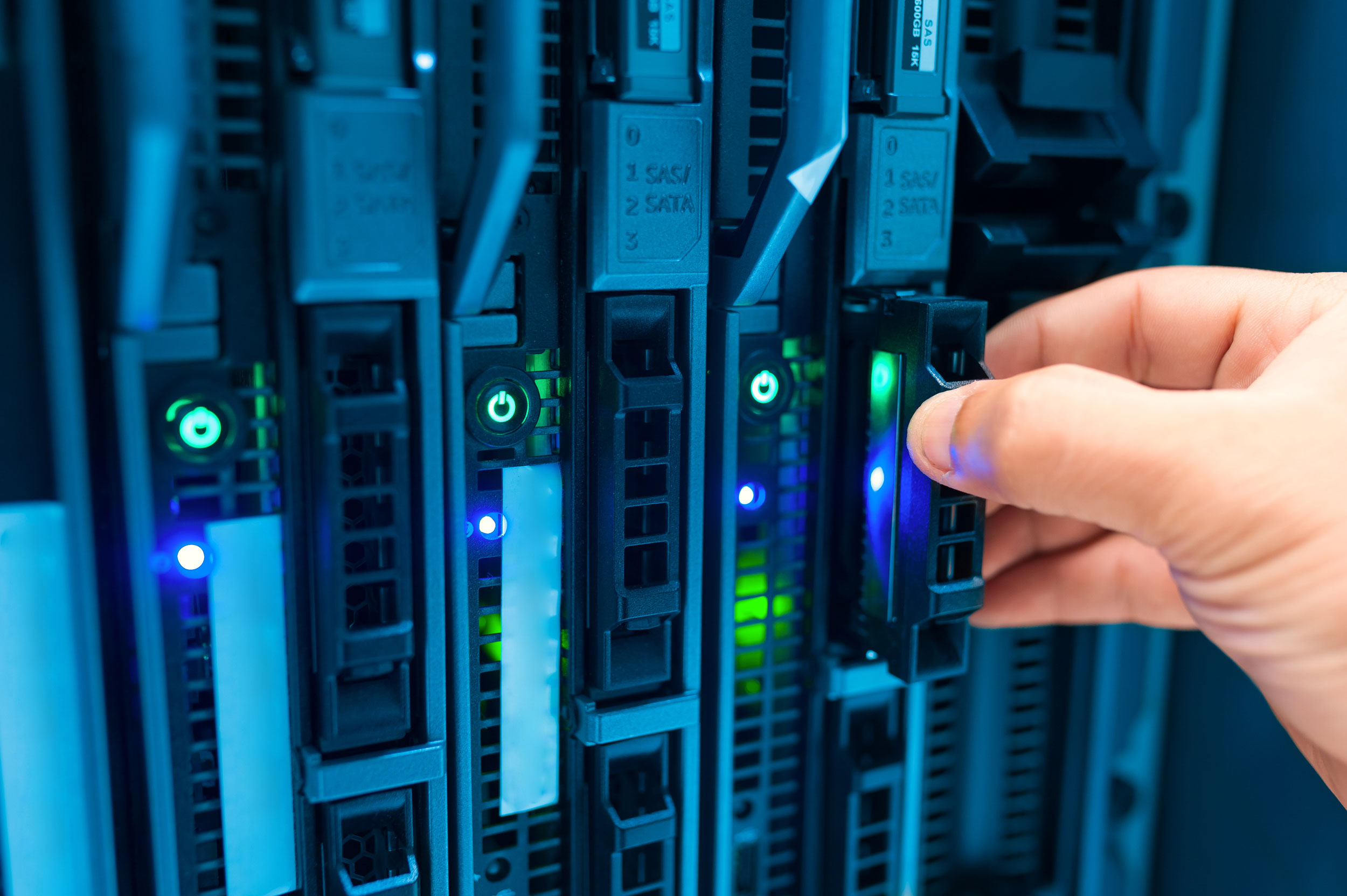 Man Working On Server In Network Data Center Shutterstock 538152997 Man fix server in data center room