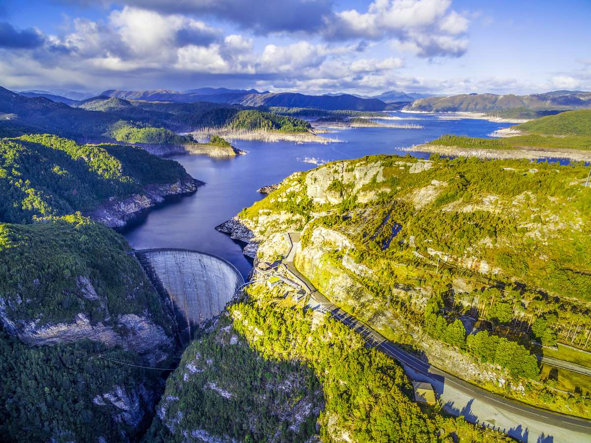 Aerial View Of Gordon Dam And Lake At Sunset 