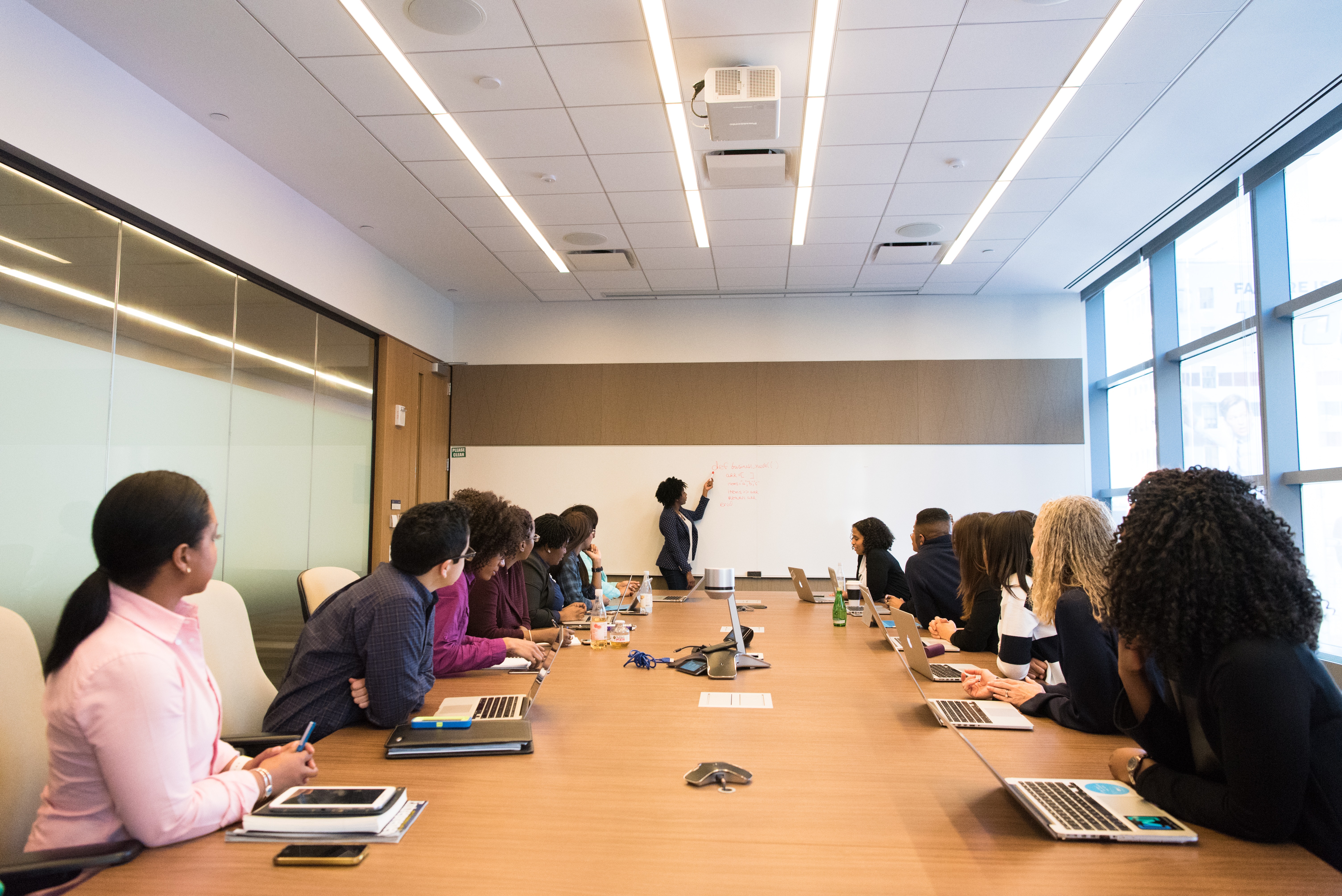 Employees In Training A group of employees attending a training session in a conference room