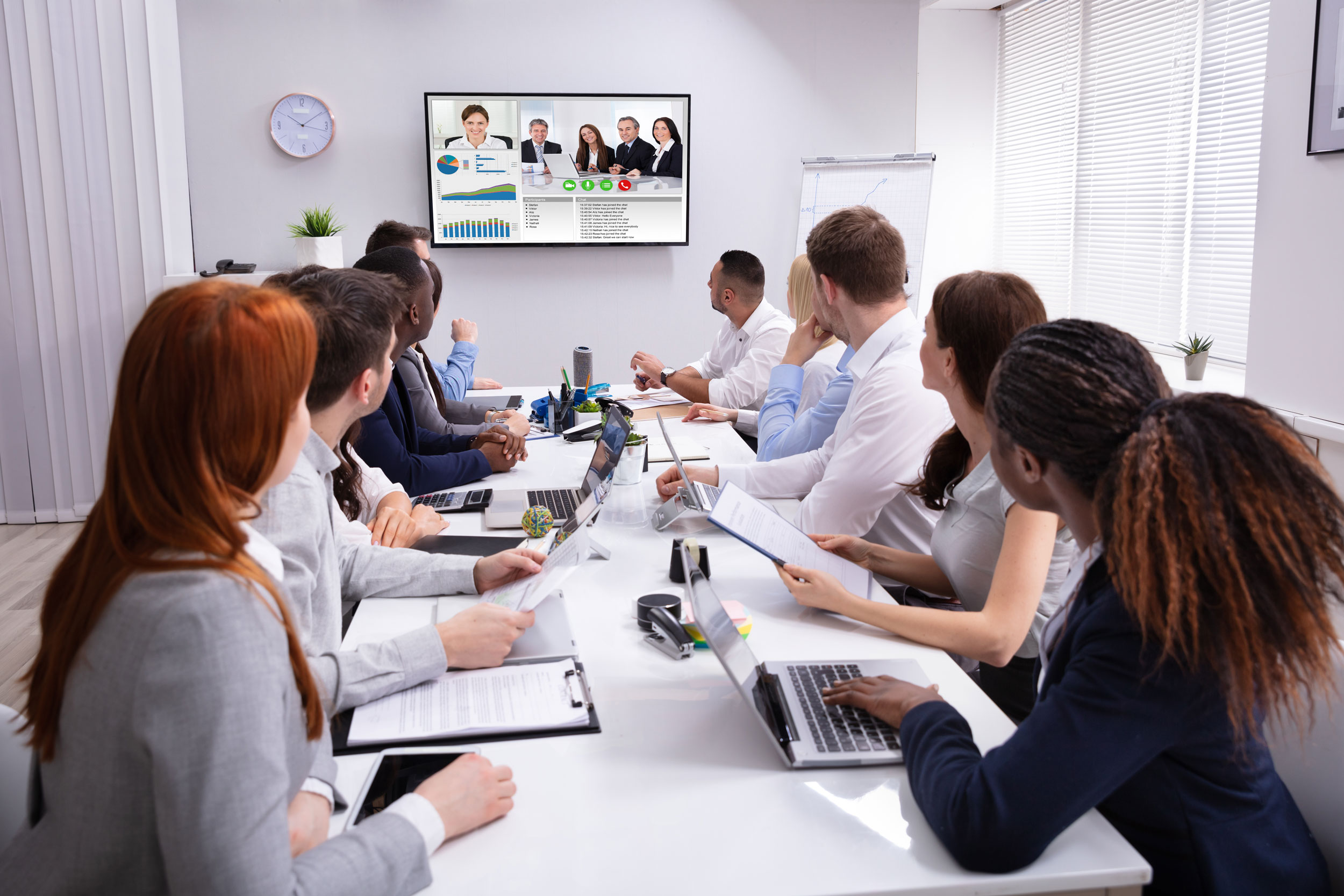 Group_Of_People_Having_Video_Conference Group_Of_People_Having_Video_Conference