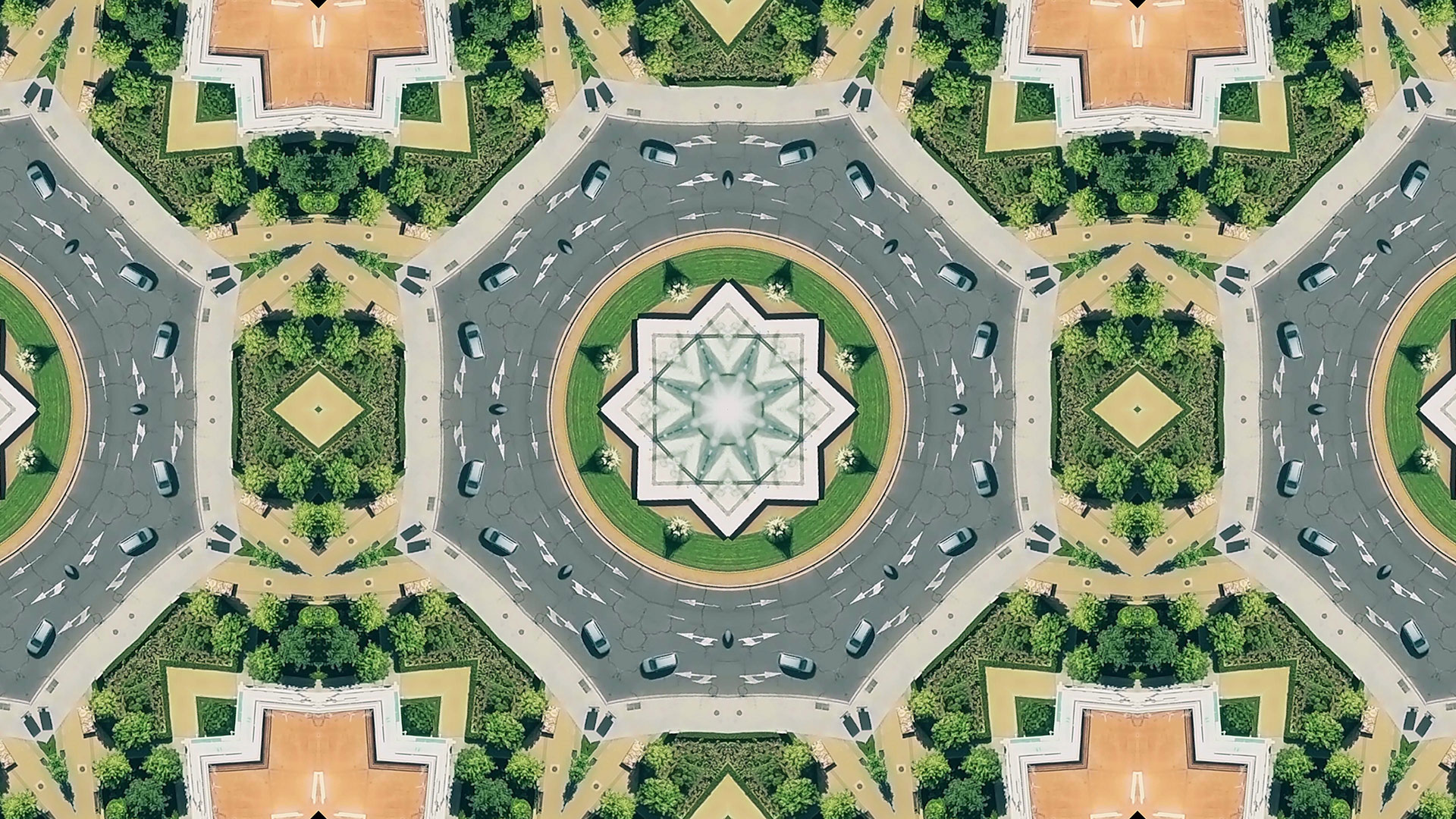 Aerial top shot of a city roundabout traffic