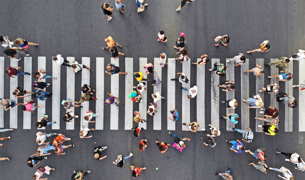 Aerial of pedestrians crossing crosswalk