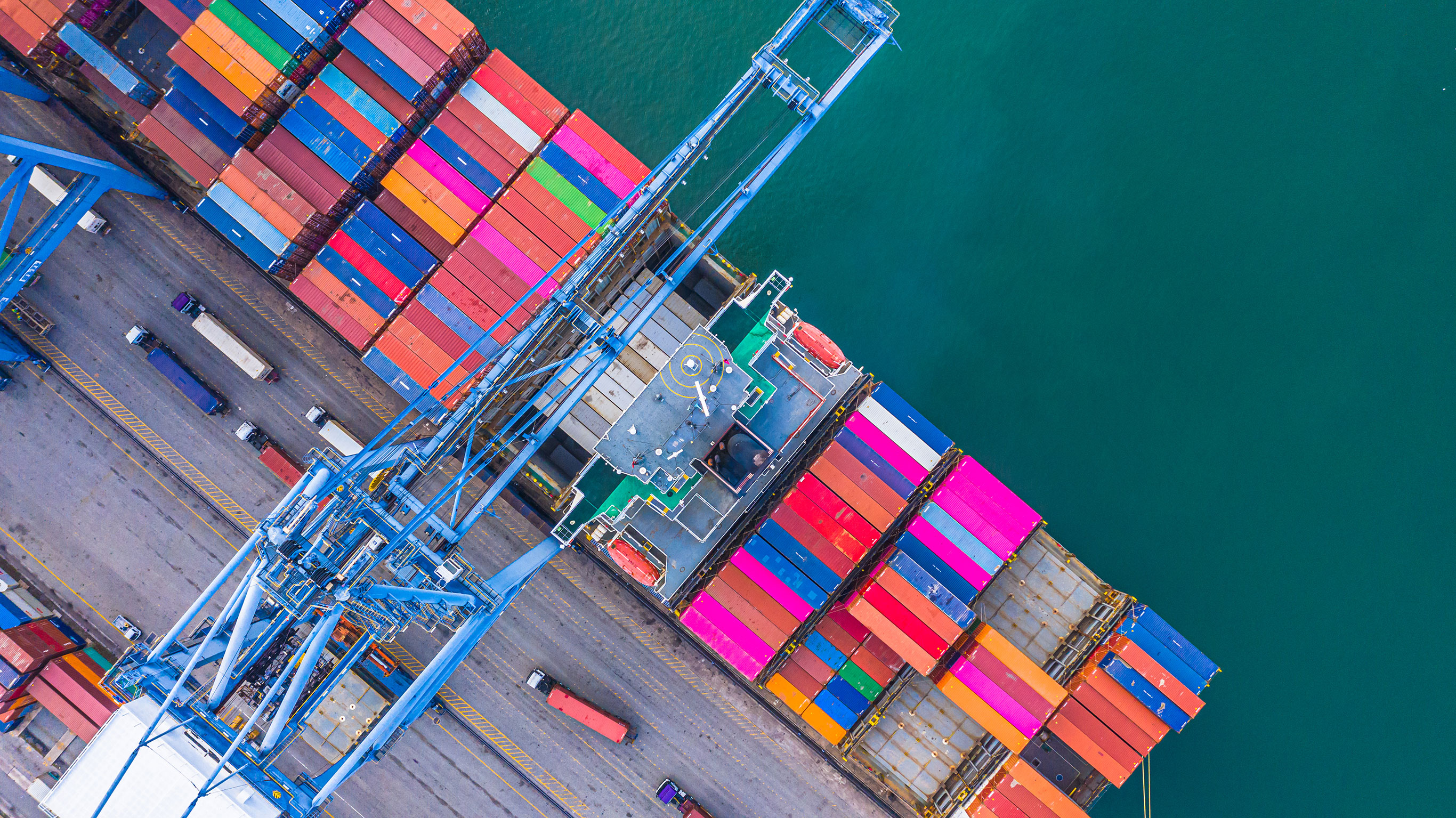 Container_Ship_Loading_Aerial Container ship loading and unloading in sea port