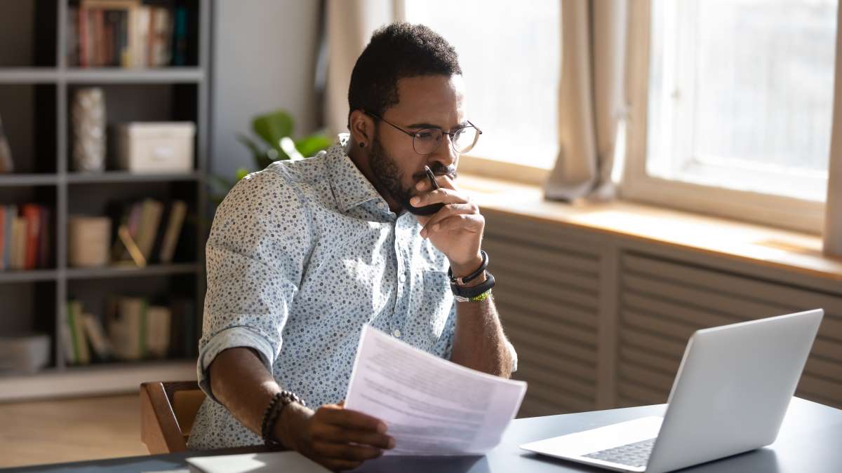 Focused Business Man Doing Tech Research