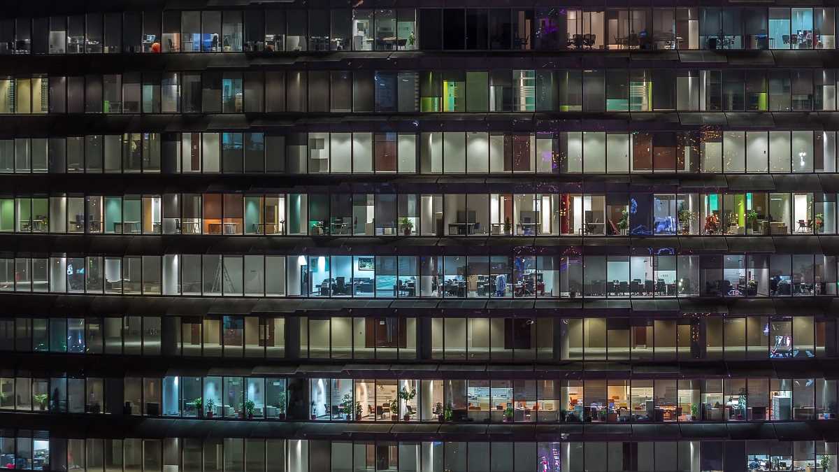 Evening view of glass office building Evening view of glass office building