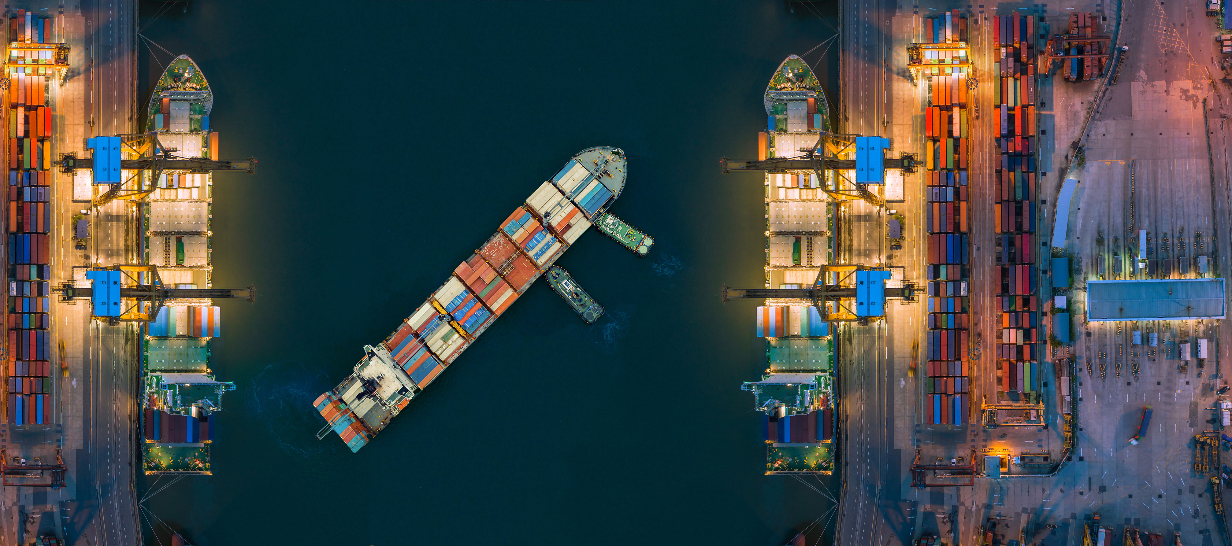 Barge_in_Port_Aerial Container ship from sea port working for delivery