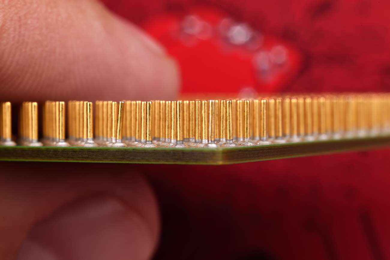 Fingers_Holding_CPU_Closeup