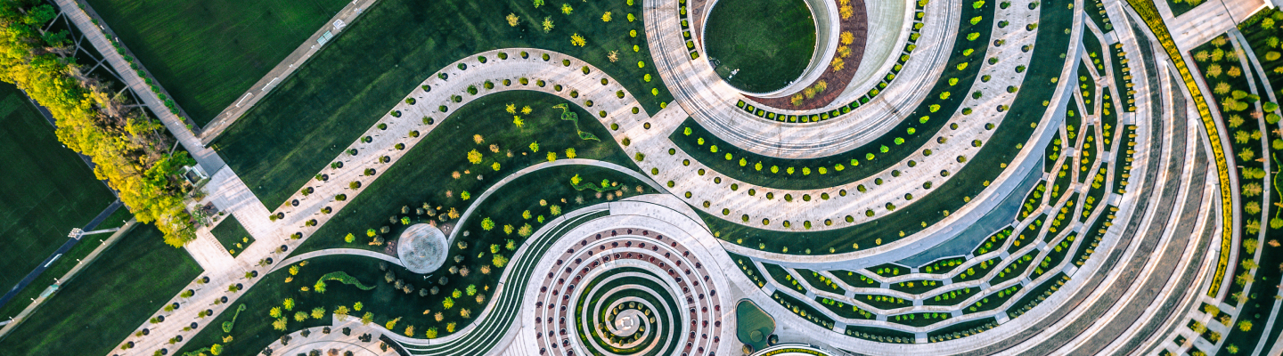 Aerial view of green landscape with ancient architecture