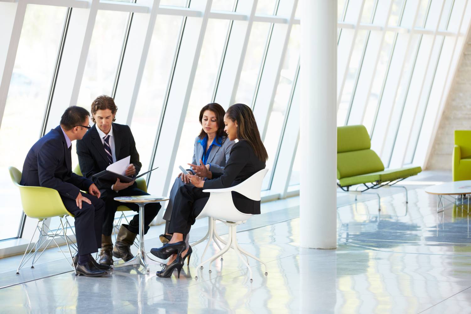 Asian_Businesspeople_Meeting_in_Foyer Asian_Businesspeople_Meeting_in_Foyer
